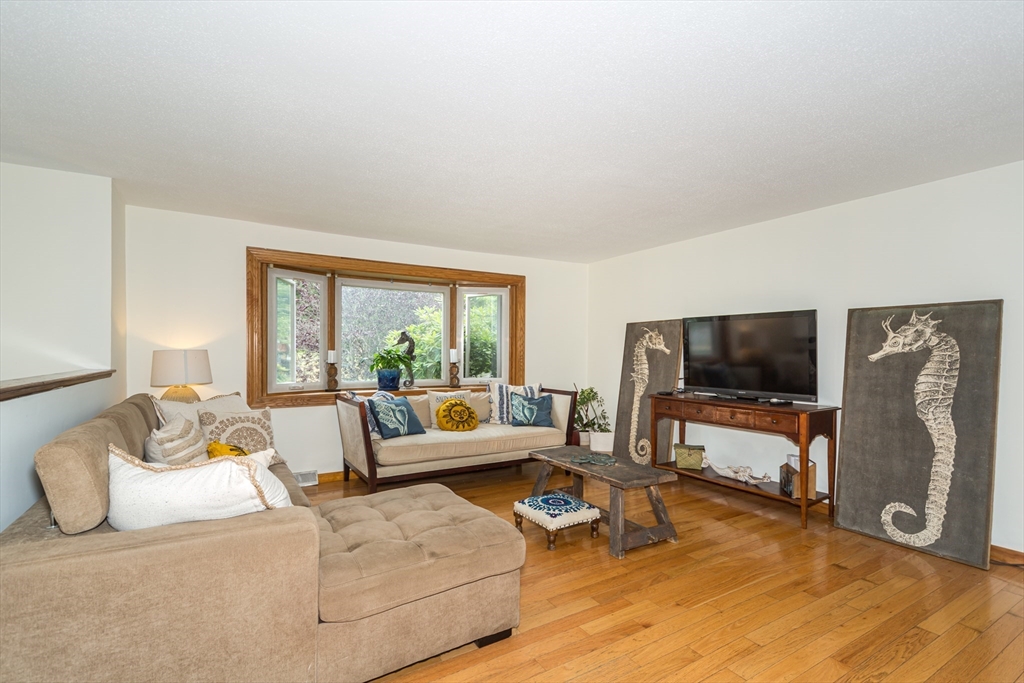 266 Mason Road Northbridge, MA 01588 - Photo 4 of 25 a living room with furniture and a flat screen tv