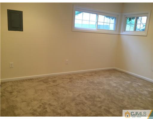 21 Stony Road Edison, NJ 08817 - Photo 17 of 23 an empty room with windows