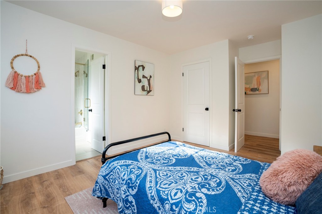 1718 West 27th Street San Pedro, CA 90732 - Photo 28 of 42 a bedroom with a bed and a window