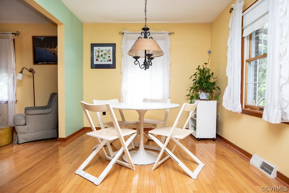 2763 Lockett Road Rice, VA 23966 - Photo 12 of 49 a view of a dining room with furniture window and wooden floor