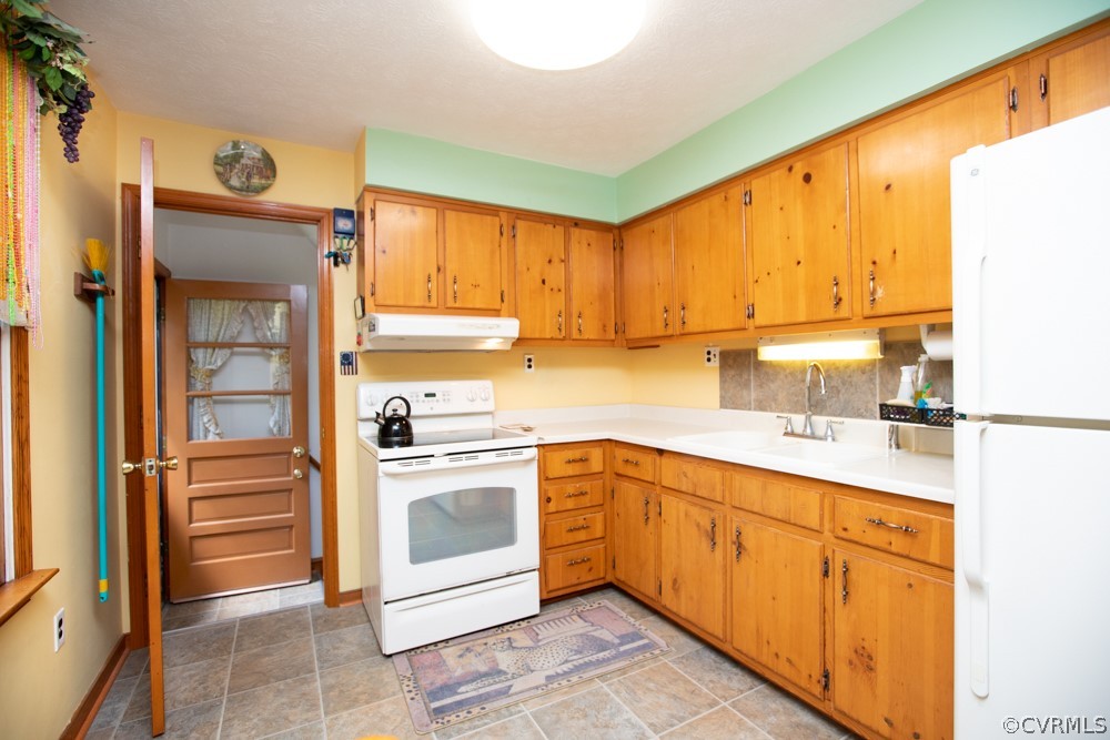 2763 Lockett Road Rice, VA 23966 - Photo 14 of 49 a kitchen with cabinets appliances and a window