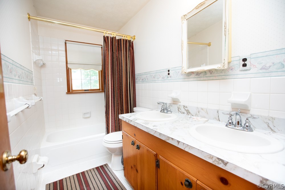 2763 Lockett Road Rice, VA 23966 - Photo 22 of 49 a bathroom with a sink a toilet and a mirror