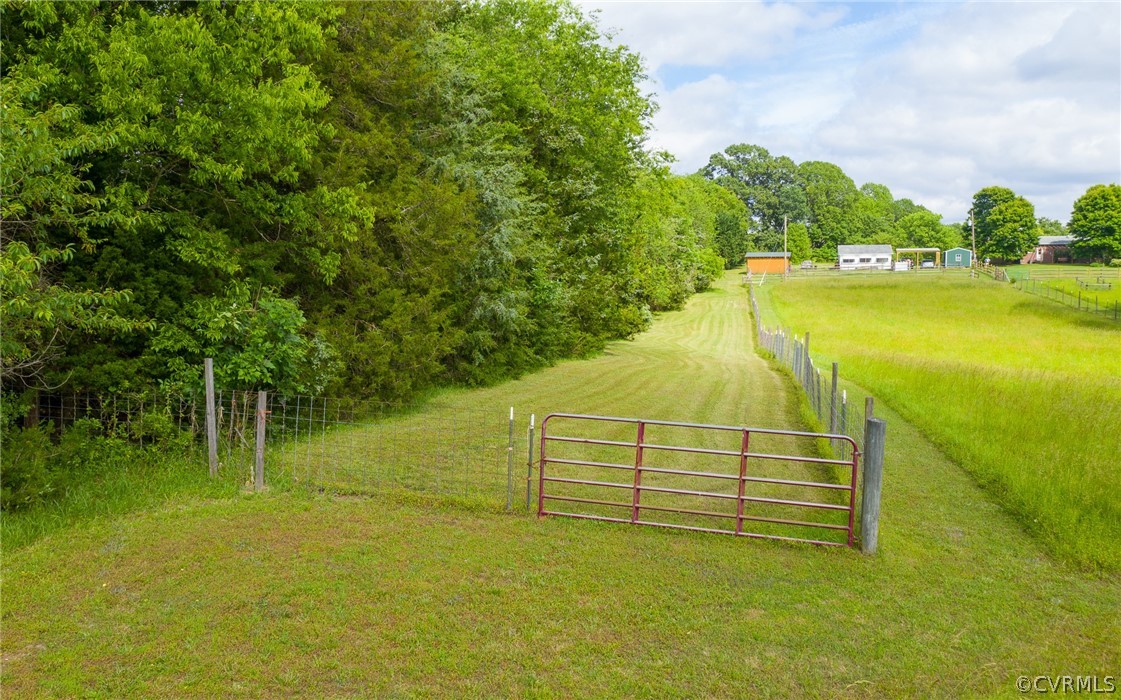 2763 Lockett Road Rice, VA 23966 - Photo 44 of 49 a view of a lake with a yard