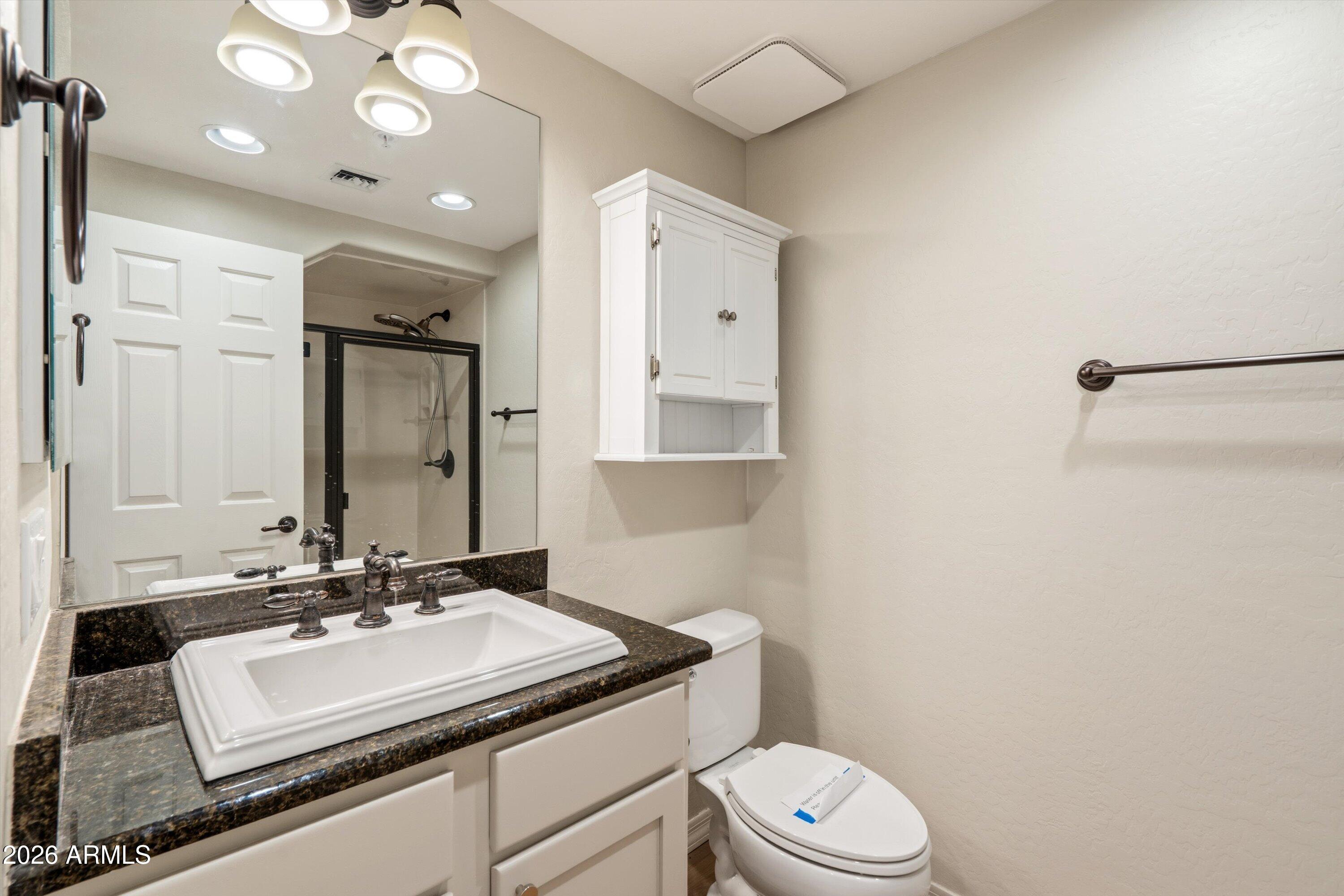 3935 East Rough Rider Road, Unit 1034 Phoenix, AZ 85050 - Photo 17 of 25 Bathroom 2