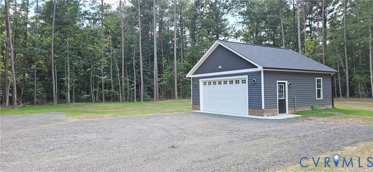 2982 Ashdale Road Center Cross, VA 22437 - Photo 7 of 23 Detached garage with dark gray siding, white garag