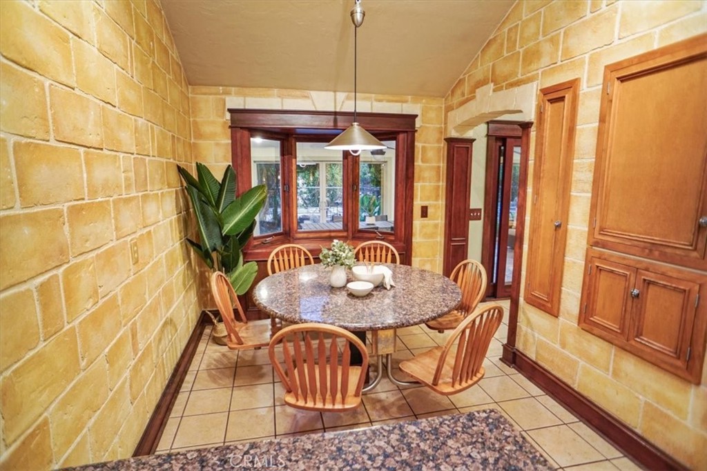 25326 Avenida Cappela Valencia, CA 91355 - Photo 10 of 48 a view of a dining room with furniture window and outside view