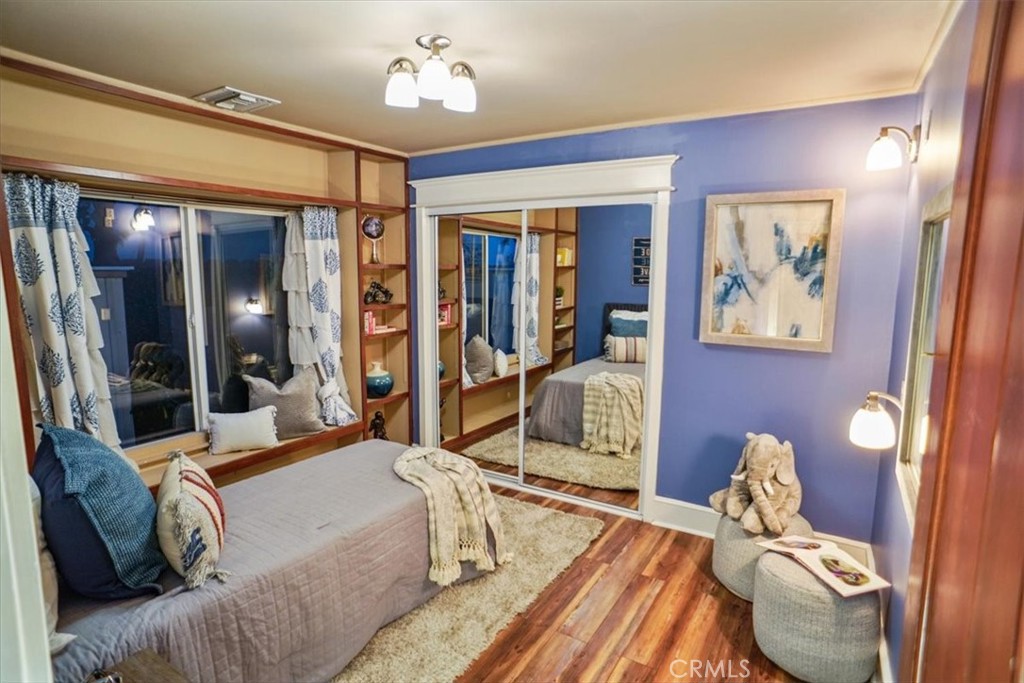25326 Avenida Cappela Valencia, CA 91355 - Photo 19 of 48 a living room with furniture flowerpot and window