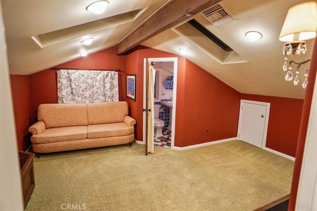 25326 Avenida Cappela Valencia, CA 91355 - Photo 23 of 48 a living room with furniture