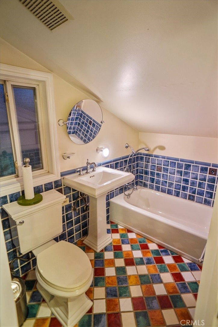 25326 Avenida Cappela Valencia, CA 91355 - Photo 25 of 48 a bathroom with a sink and a bathtub