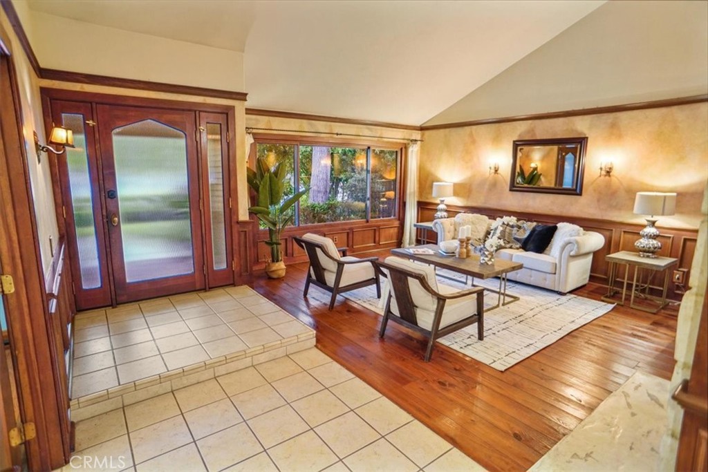 25326 Avenida Cappela Valencia, CA 91355 - Photo 3 of 48 a living room with furniture and a window