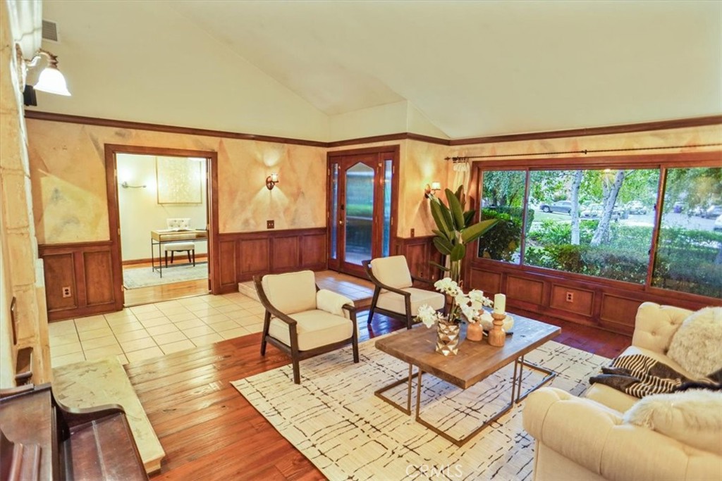 25326 Avenida Cappela Valencia, CA 91355 - Photo 4 of 48 a living room with furniture and a large window
