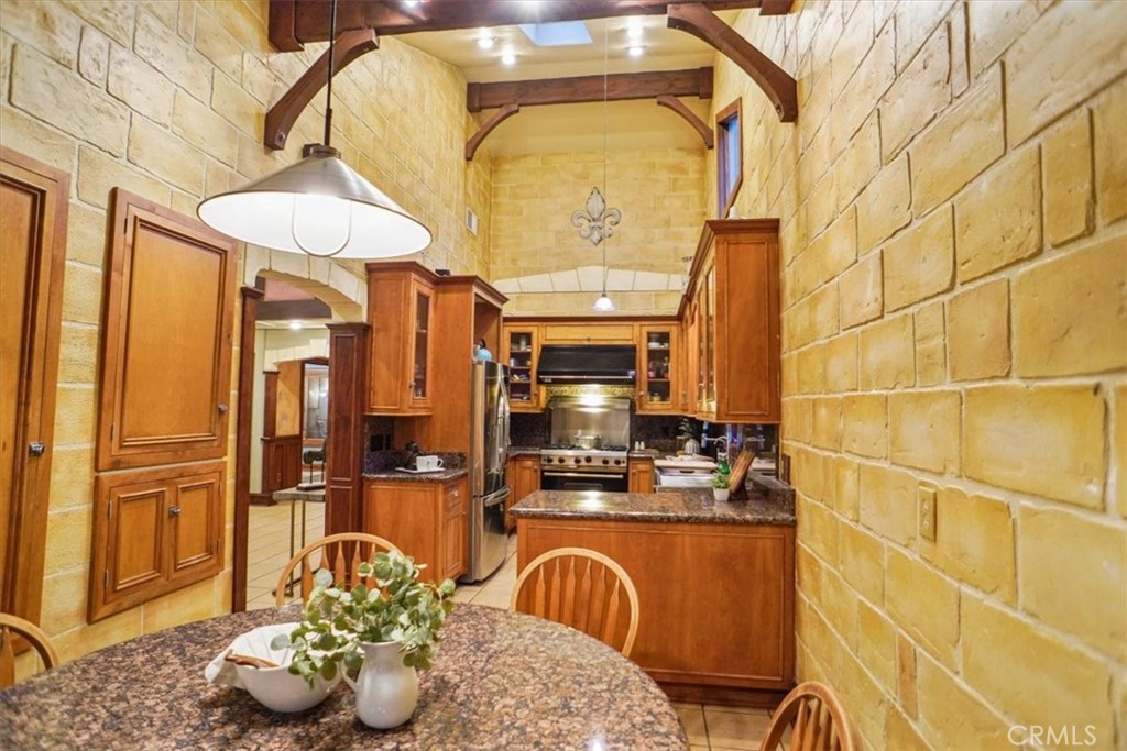 25326 Avenida Cappela Valencia, CA 91355 - Photo 8 of 48 a bathroom with a sink and a mirror