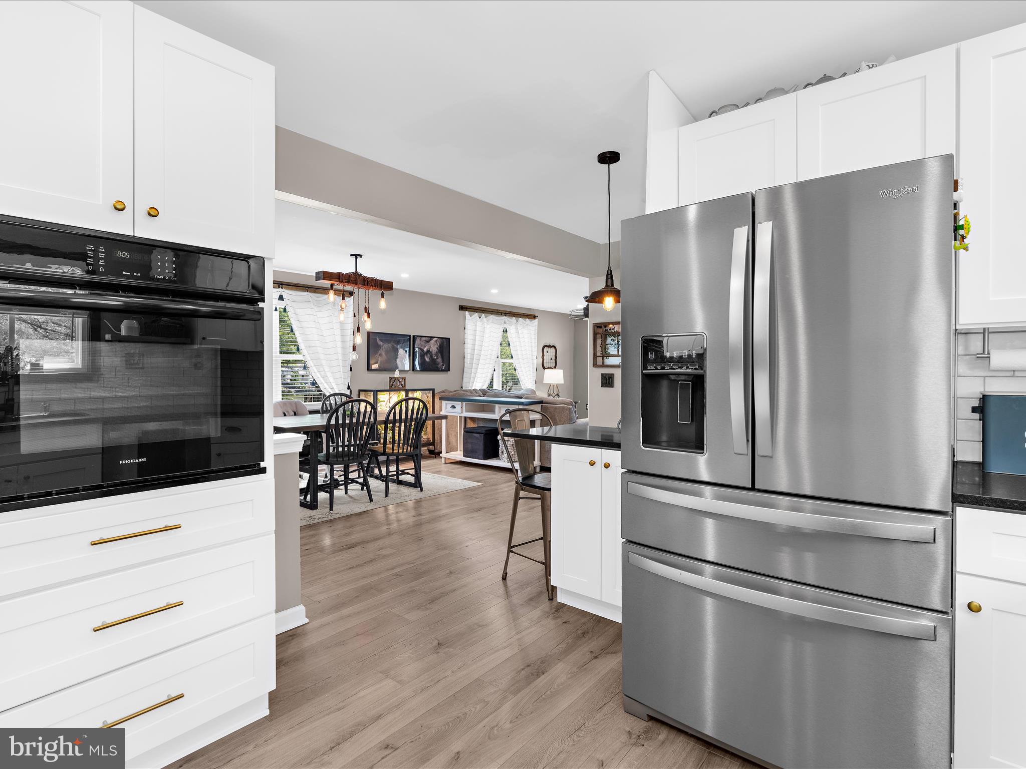 8111 Dogwood Road Sparrows Point, MD 21219 - Photo 8 of 51 Wall oven and stainless refrigerator