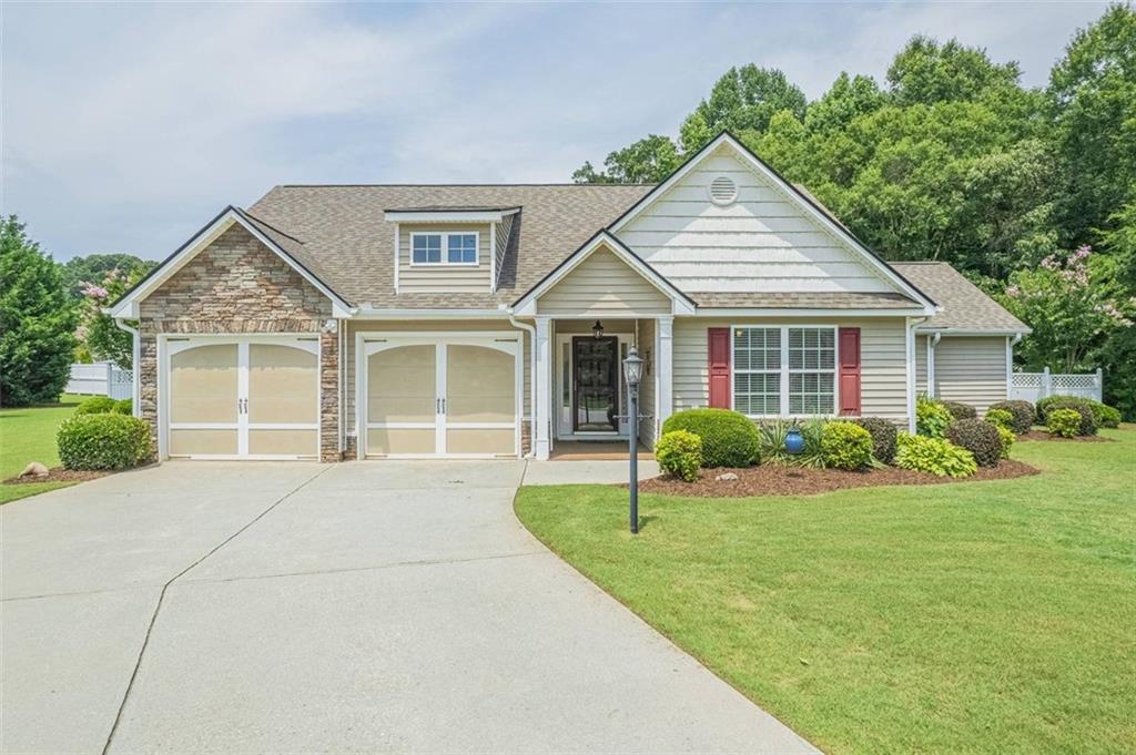 459 Briarcrest Drive Jefferson, GA 30549 - Photo 1 of 1 a front view of a house with a yard