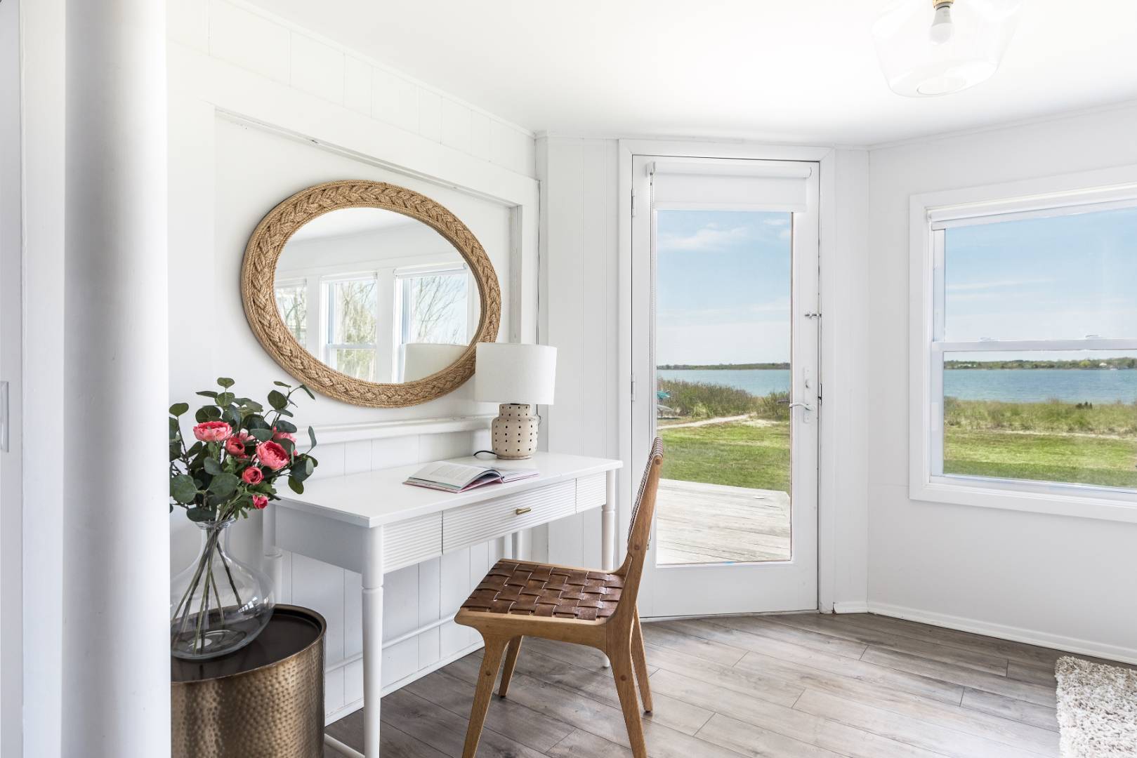351 East Lake Drive Montauk, NY 11954 - Photo 11 of 30 a dining room with furniture and a potted plant