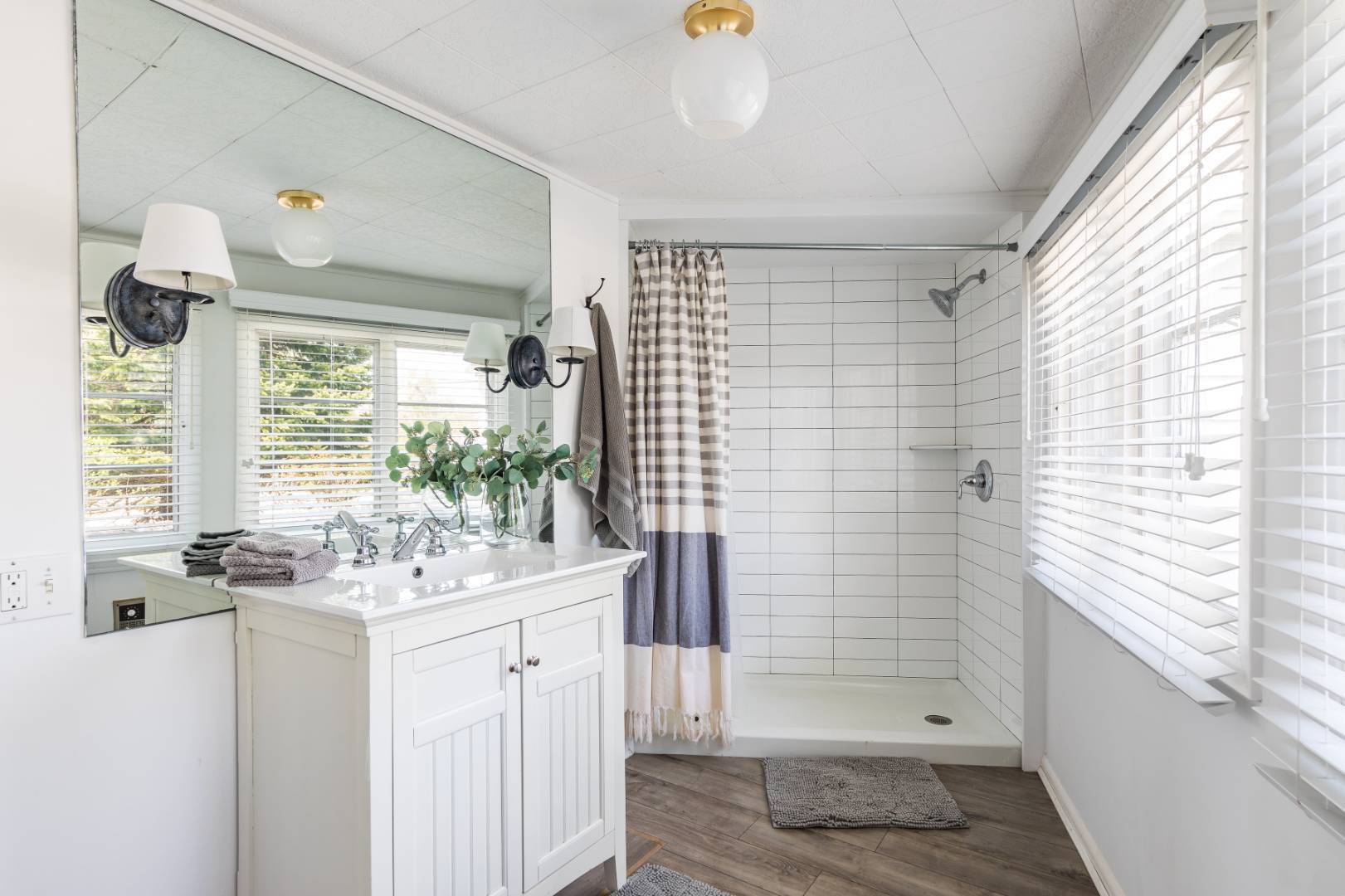 351 East Lake Drive Montauk, NY 11954 - Photo 13 of 30 a bathroom with a sink a toilet and shower