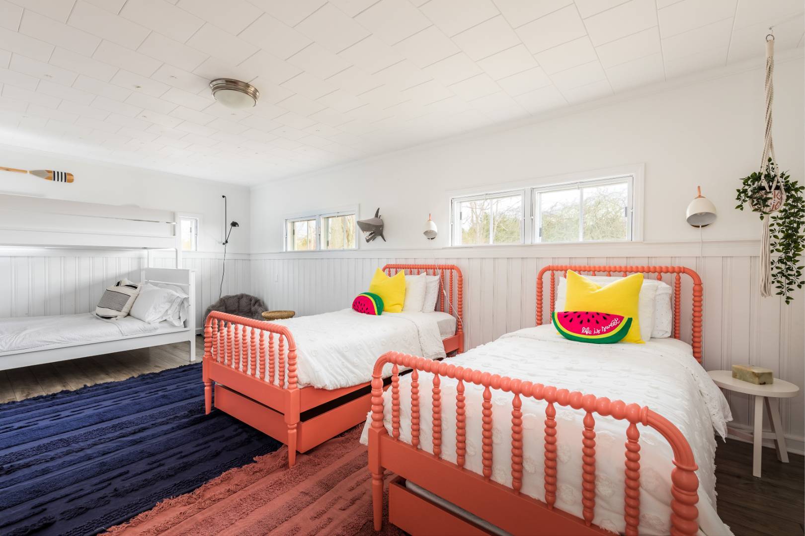 351 East Lake Drive Montauk, NY 11954 - Photo 16 of 30 a bedroom with two beds and a wooden floor