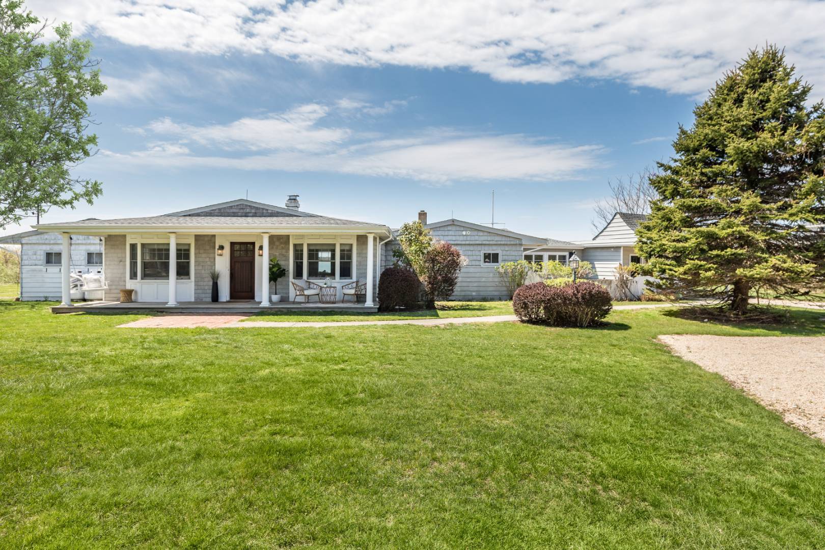 351 East Lake Drive Montauk, NY 11954 - Photo 24 of 30 a house view with swimming pool and garden space