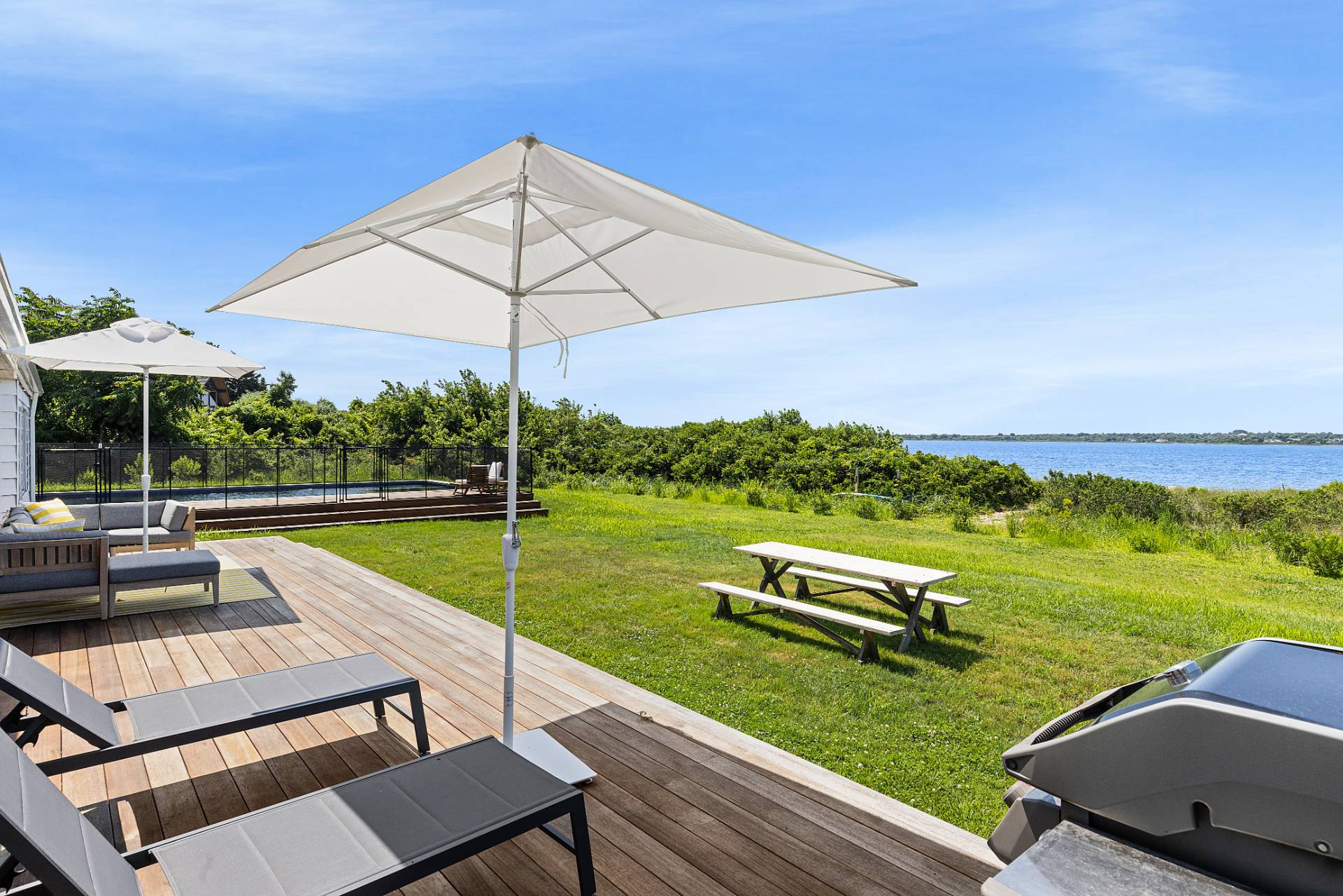 351 East Lake Drive Montauk, NY 11954 - Photo 29 of 30 an outdoor view of a garden with an outdoor seating