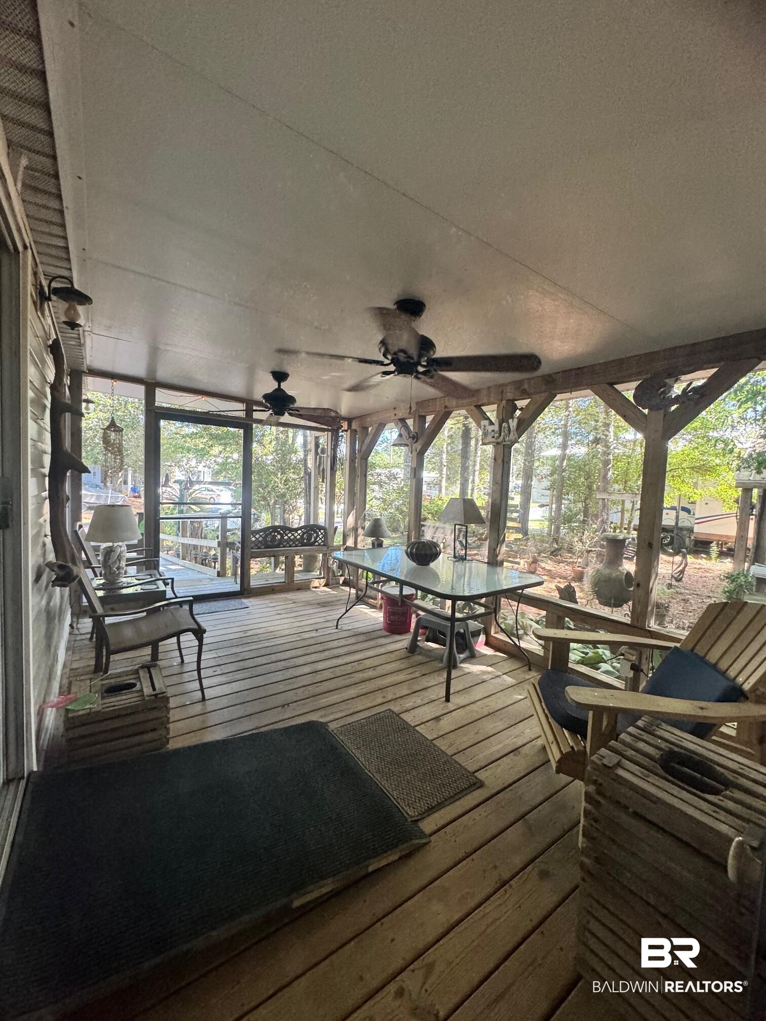 112 Horn Drive Lillian, AL 36549 - Photo 3 of 30 Wooden deck with ceiling fan