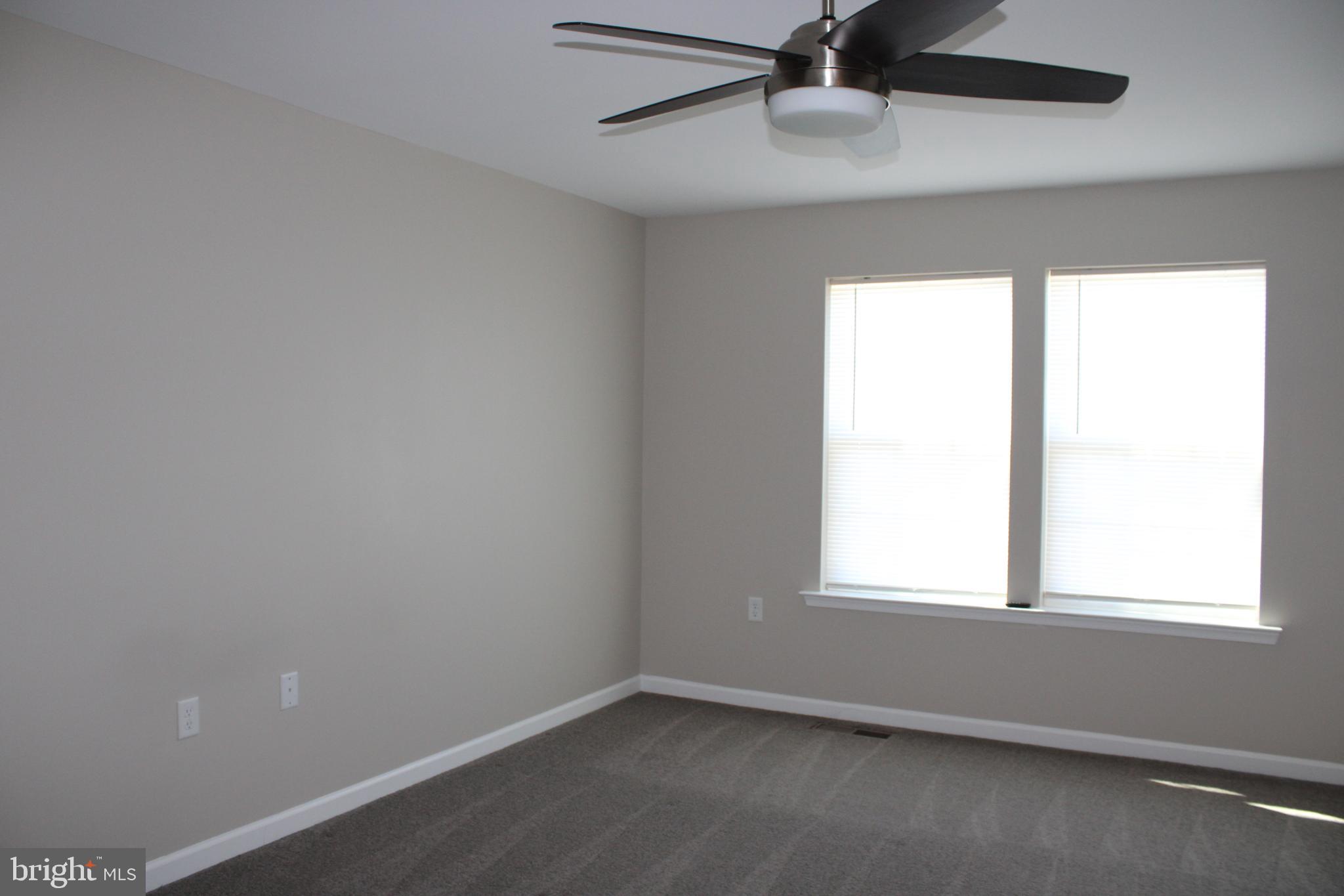 8 Cecily Way Ranson, WV 25438 - Photo 17 of 26 an empty room with a window