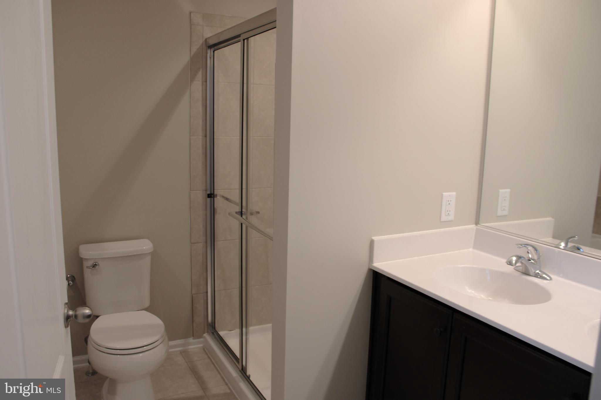 8 Cecily Way Ranson, WV 25438 - Photo 19 of 26 a bathroom with a sink and a toilet