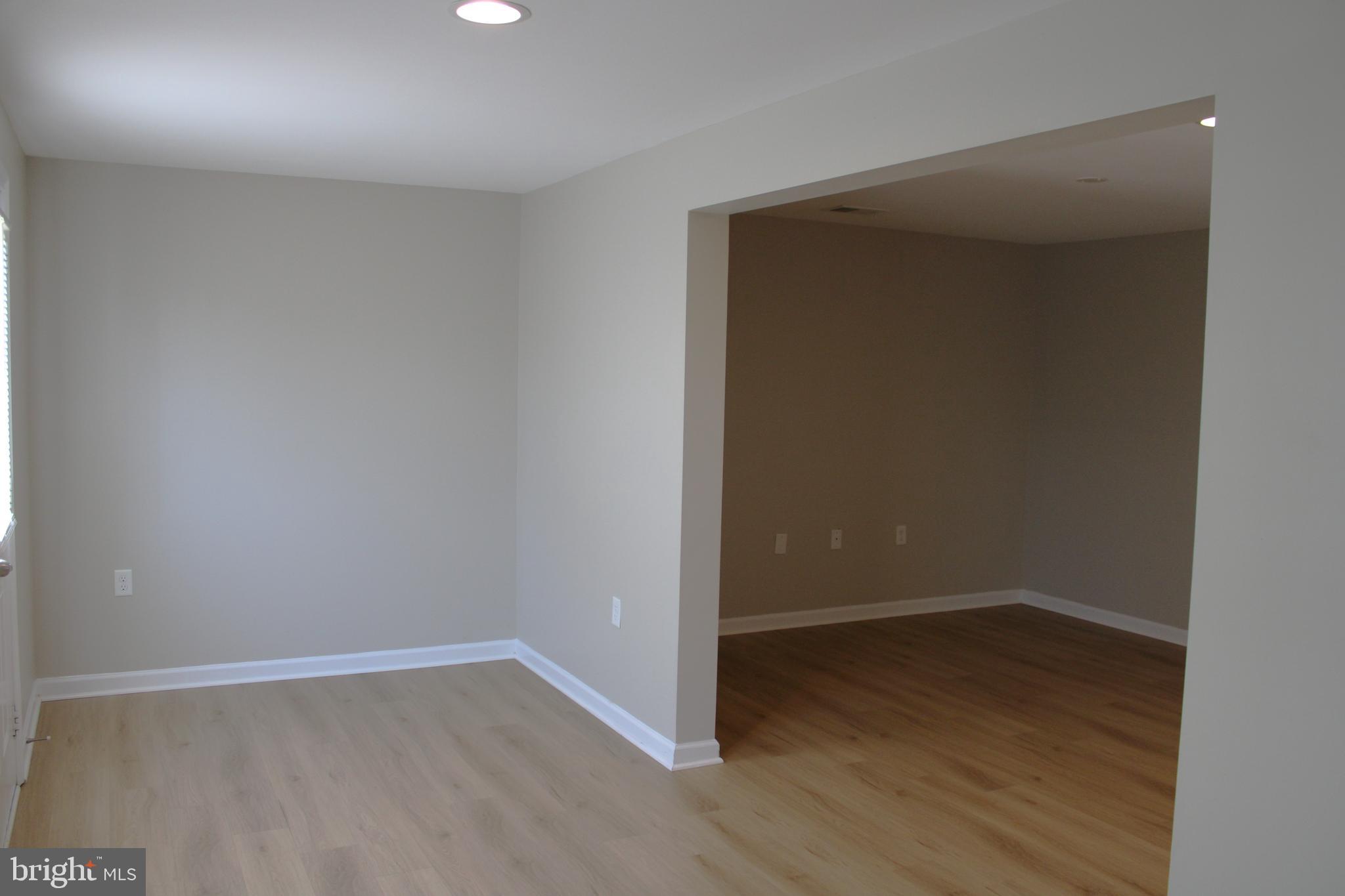 8 Cecily Way Ranson, WV 25438 - Photo 8 of 26 wooden floor in an empty room