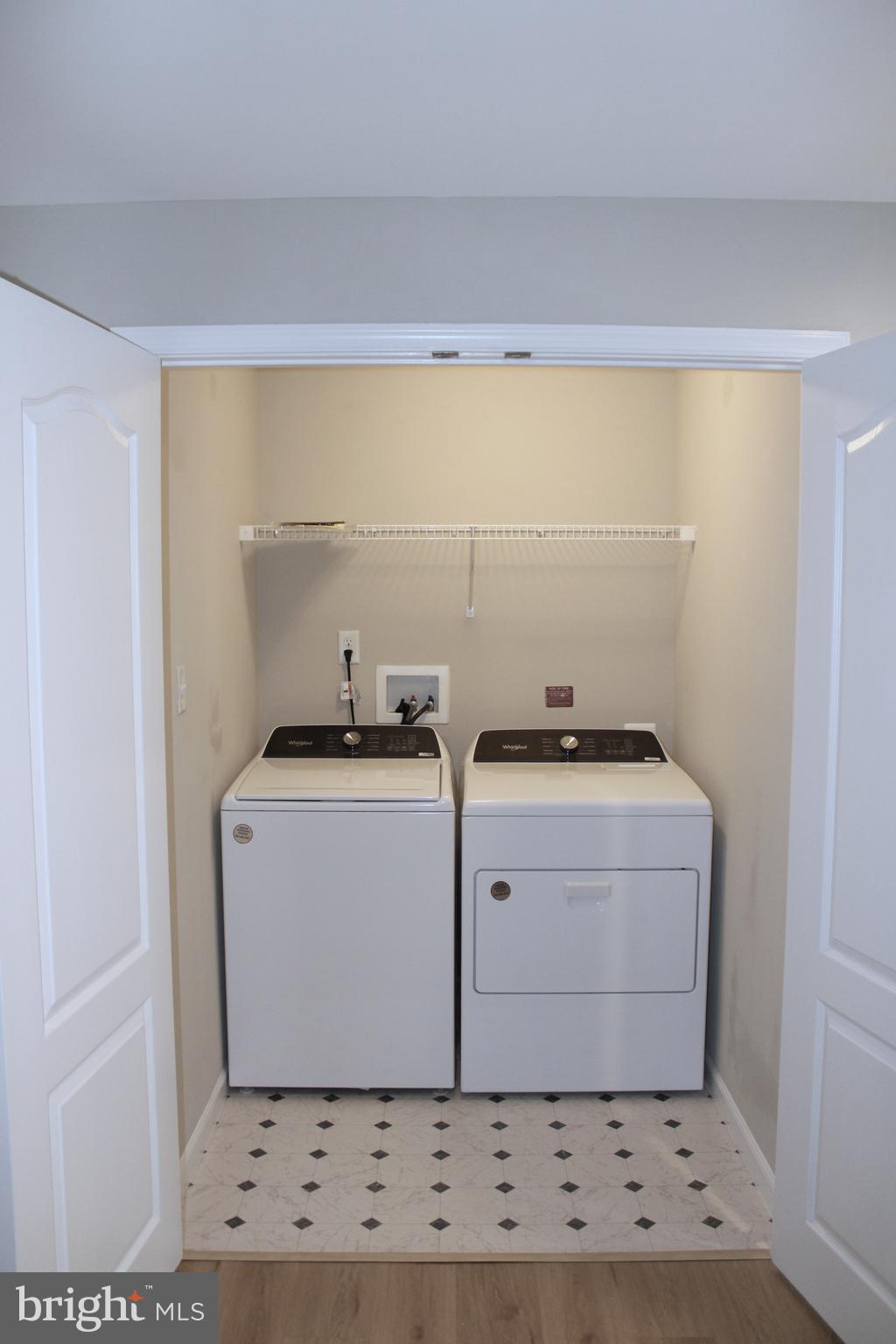 8 Cecily Way Ranson, WV 25438 - Photo 9 of 26 a utility room with washer and dryer