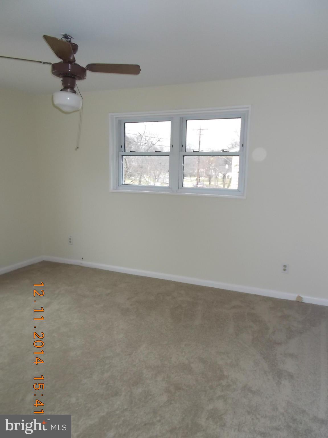 3505 May Street Silver Spring, MD 20906 - Photo 14 of 22 an empty room with a window