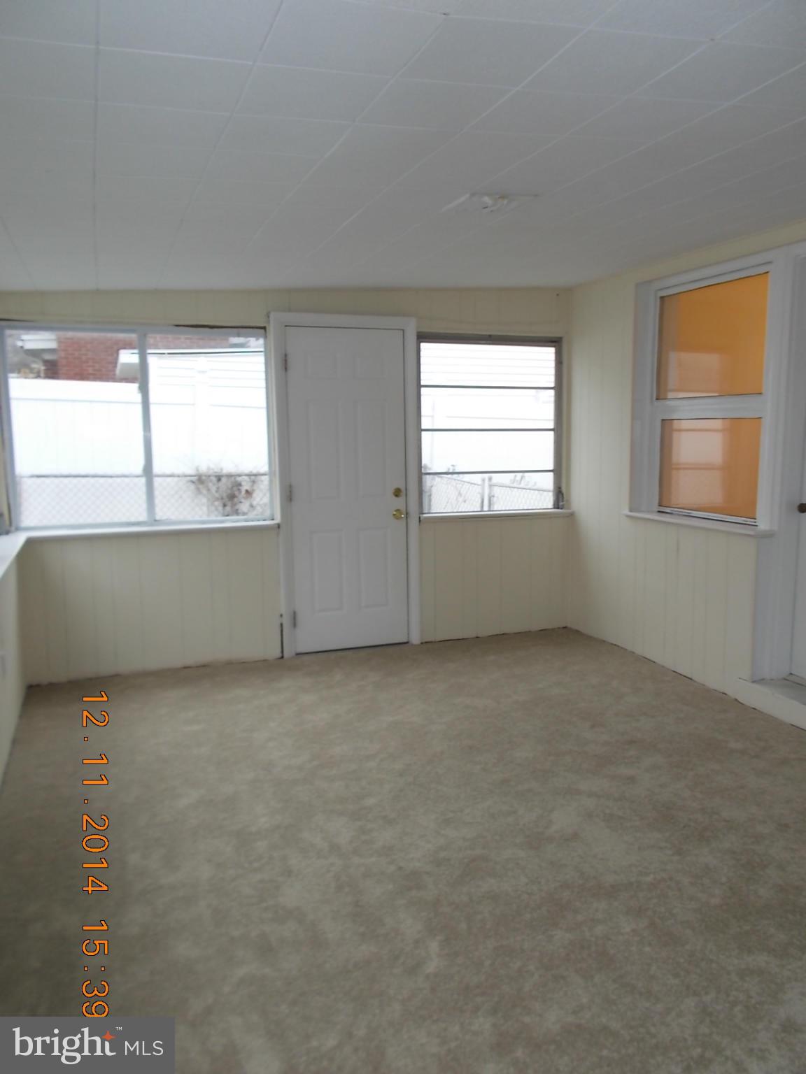 3505 May Street Silver Spring, MD 20906 - Photo 8 of 22 an empty room with a window
