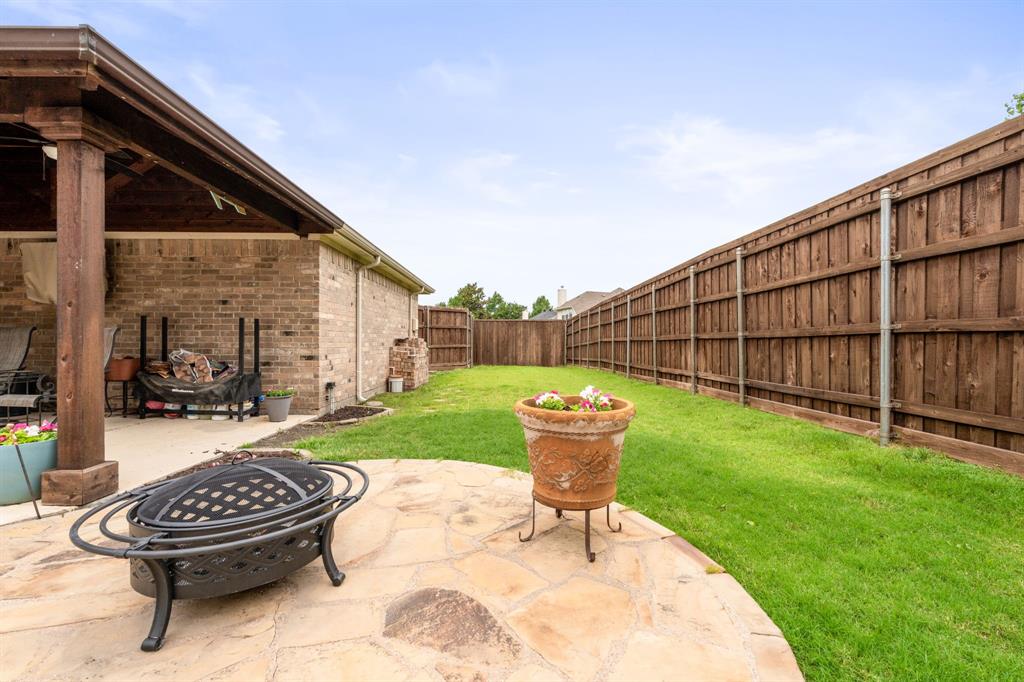 205 Crepe Myrtle Lane Murphy, TX 75094 - Photo 30 of 33 a view of backyard with seating space