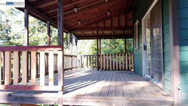 a view of a room with a large window