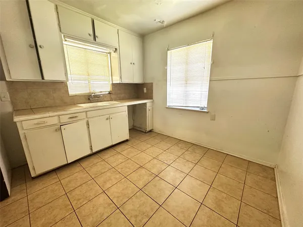 a view of a kitchen with a sink