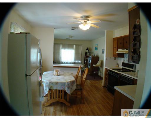 104 Idlewild Road Edison, NJ 08817 - Photo 5 of 13 a dining room with furniture and window