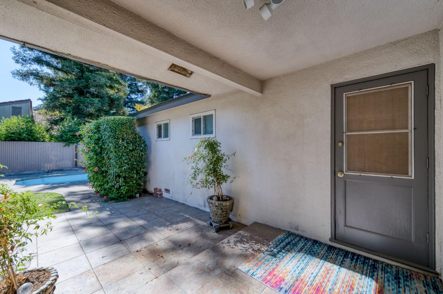 6811 North Backer Avenue Fresno, CA 93710 - Photo 21 of 26 a view of an entryway with a yard
