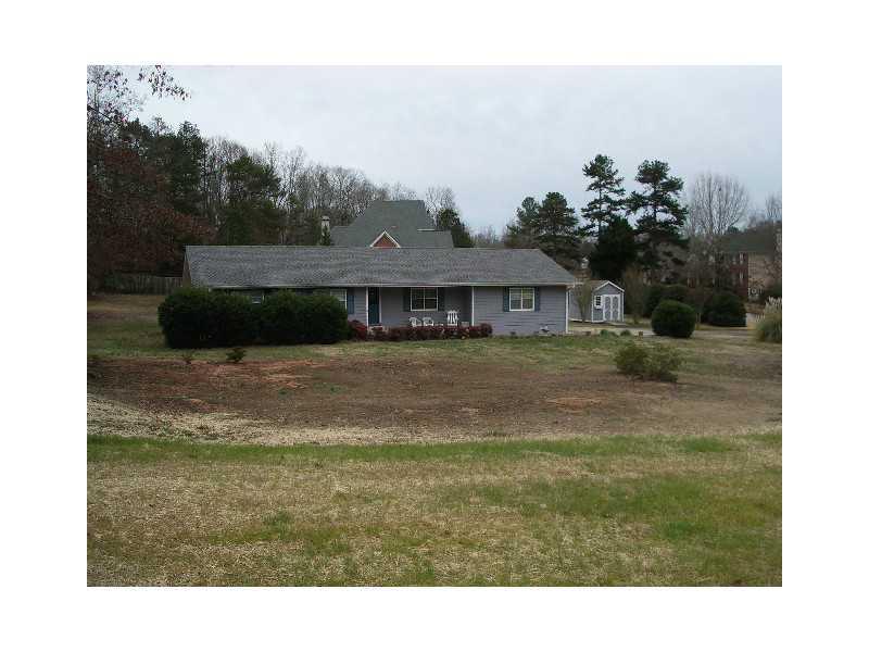 Exterior Front. Huge Yard with lots of room to run!!