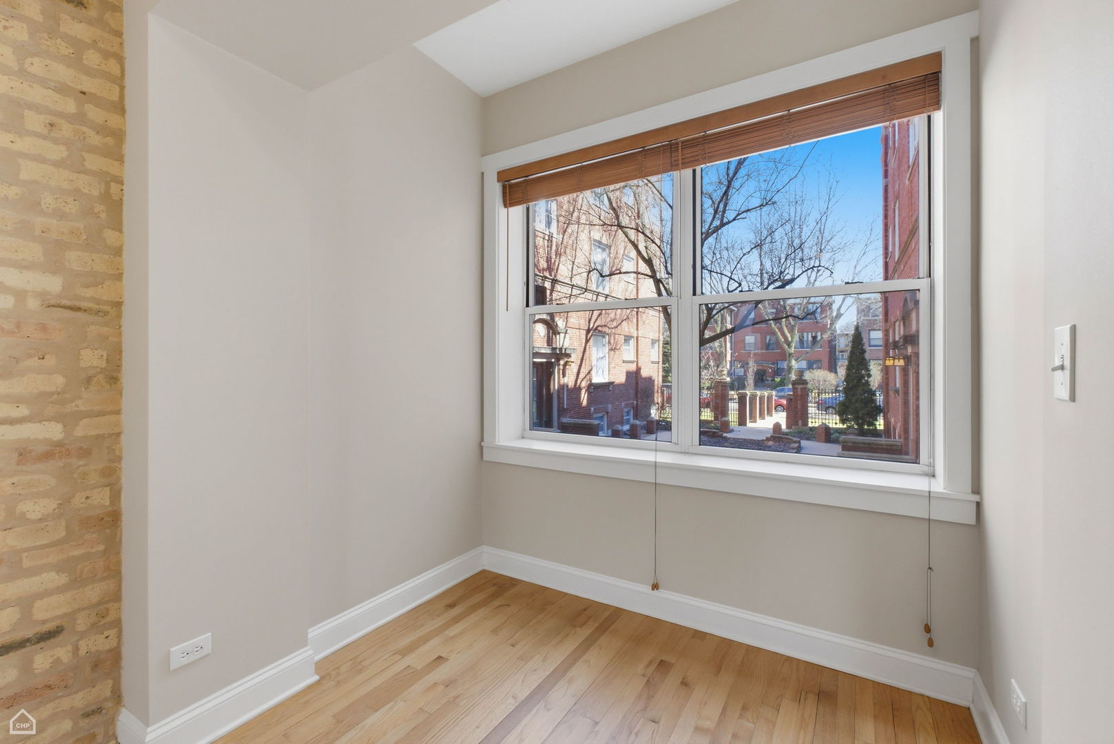 4444 North Beacon Street, Unit 1 Chicago, IL 60640 - Photo 4 of 18 a view of a room that has a large window