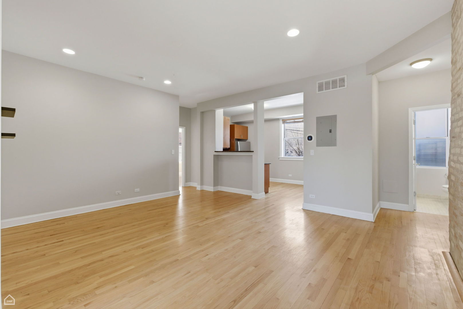 4444 North Beacon Street, Unit 1 Chicago, IL 60640 - Photo 5 of 18 a view of empty room with wooden floor