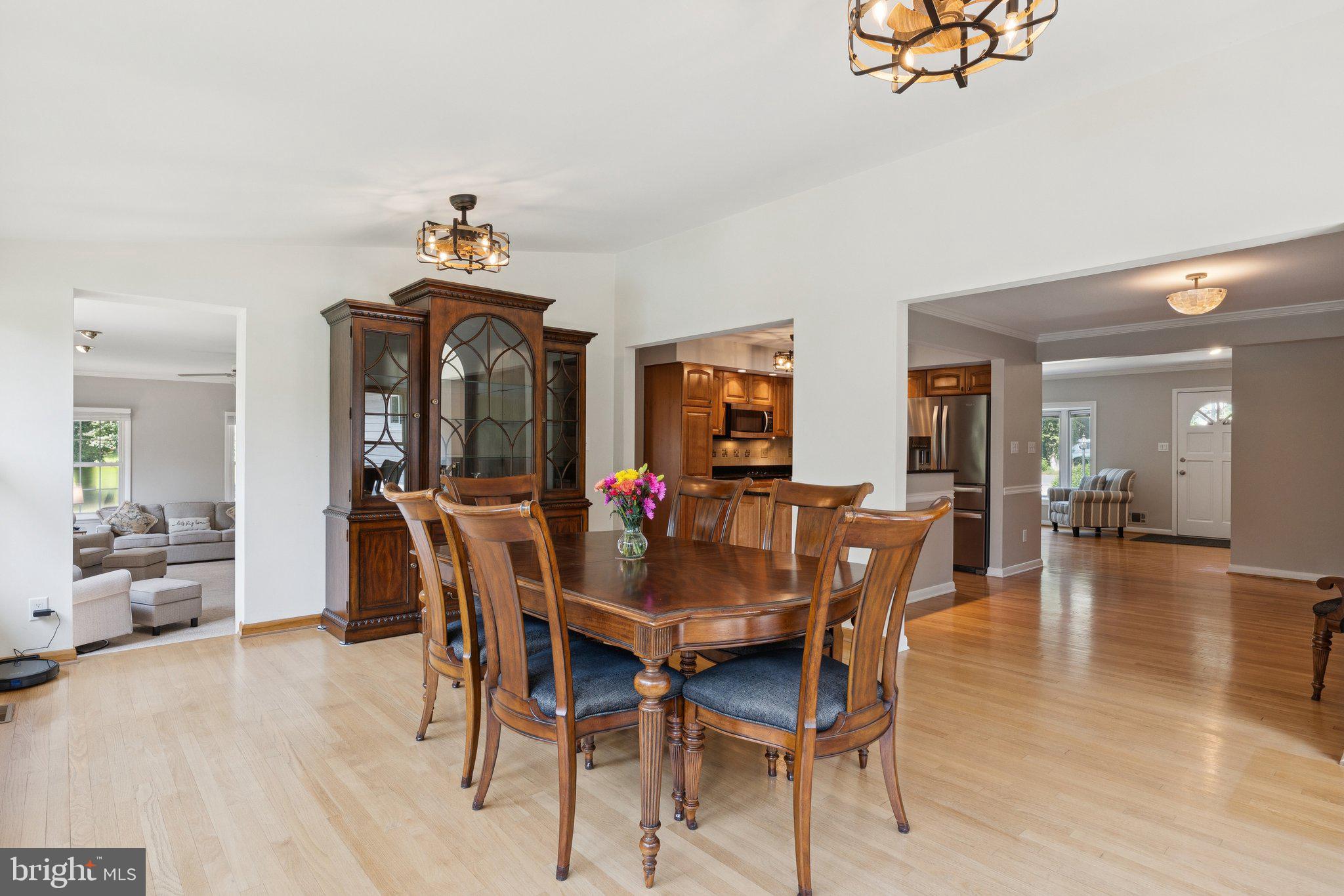346 Edgewater Road Pasadena, MD 21122 - Photo 13 of 75 a view of a dining room with furniture and wooden floor