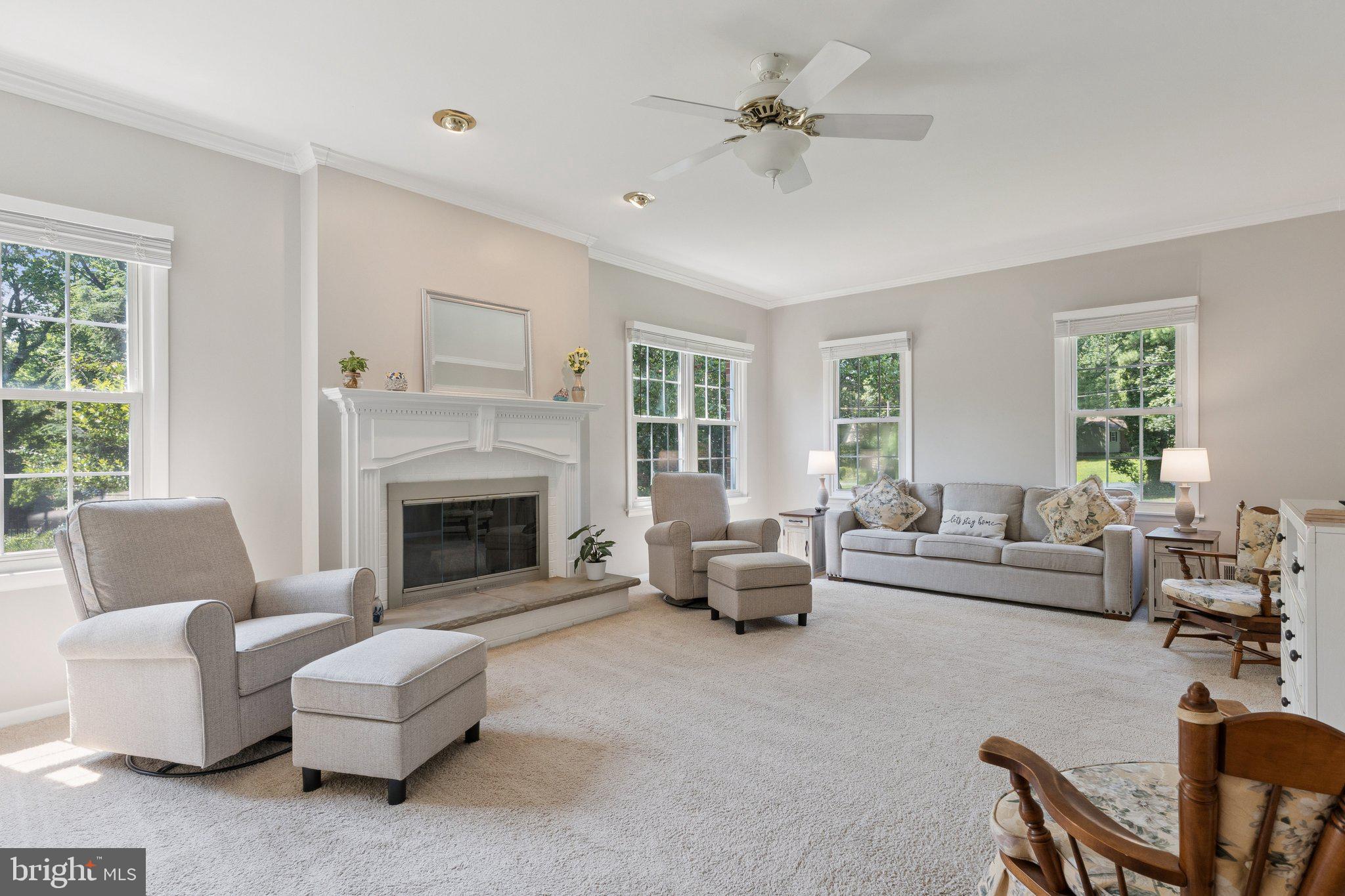 346 Edgewater Road Pasadena, MD 21122 - Photo 14 of 75 a living room with furniture and a fireplace