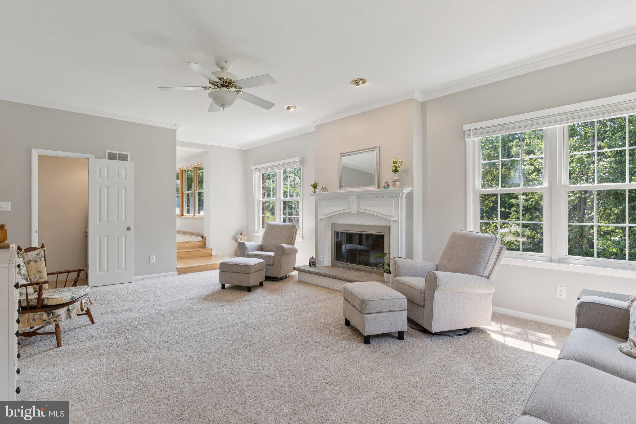 346 Edgewater Road Pasadena, MD 21122 - Photo 15 of 75 a living room with furniture and a fireplace