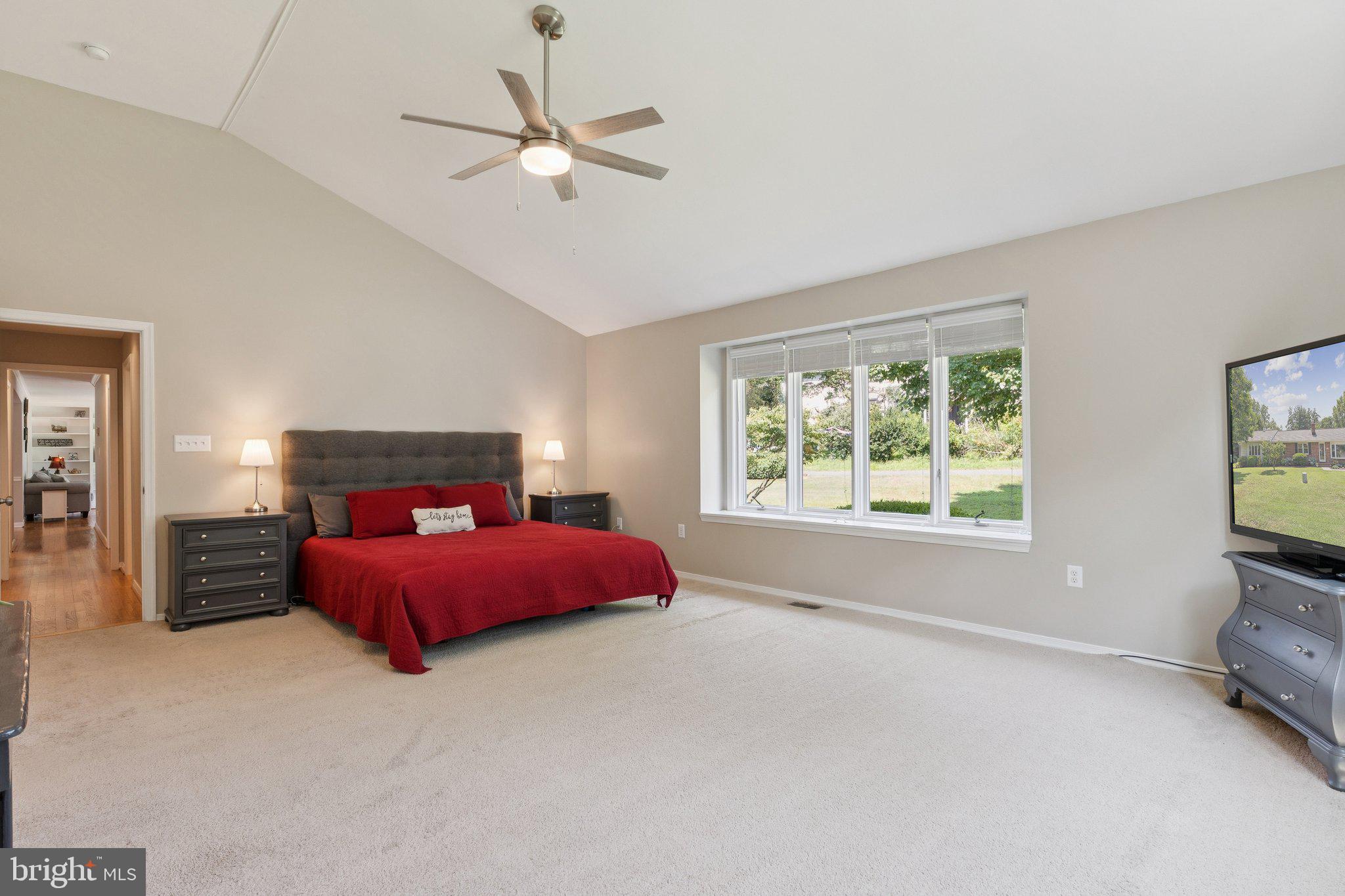 346 Edgewater Road Pasadena, MD 21122 - Photo 23 of 75 a spacious bedroom with a bed and a tv