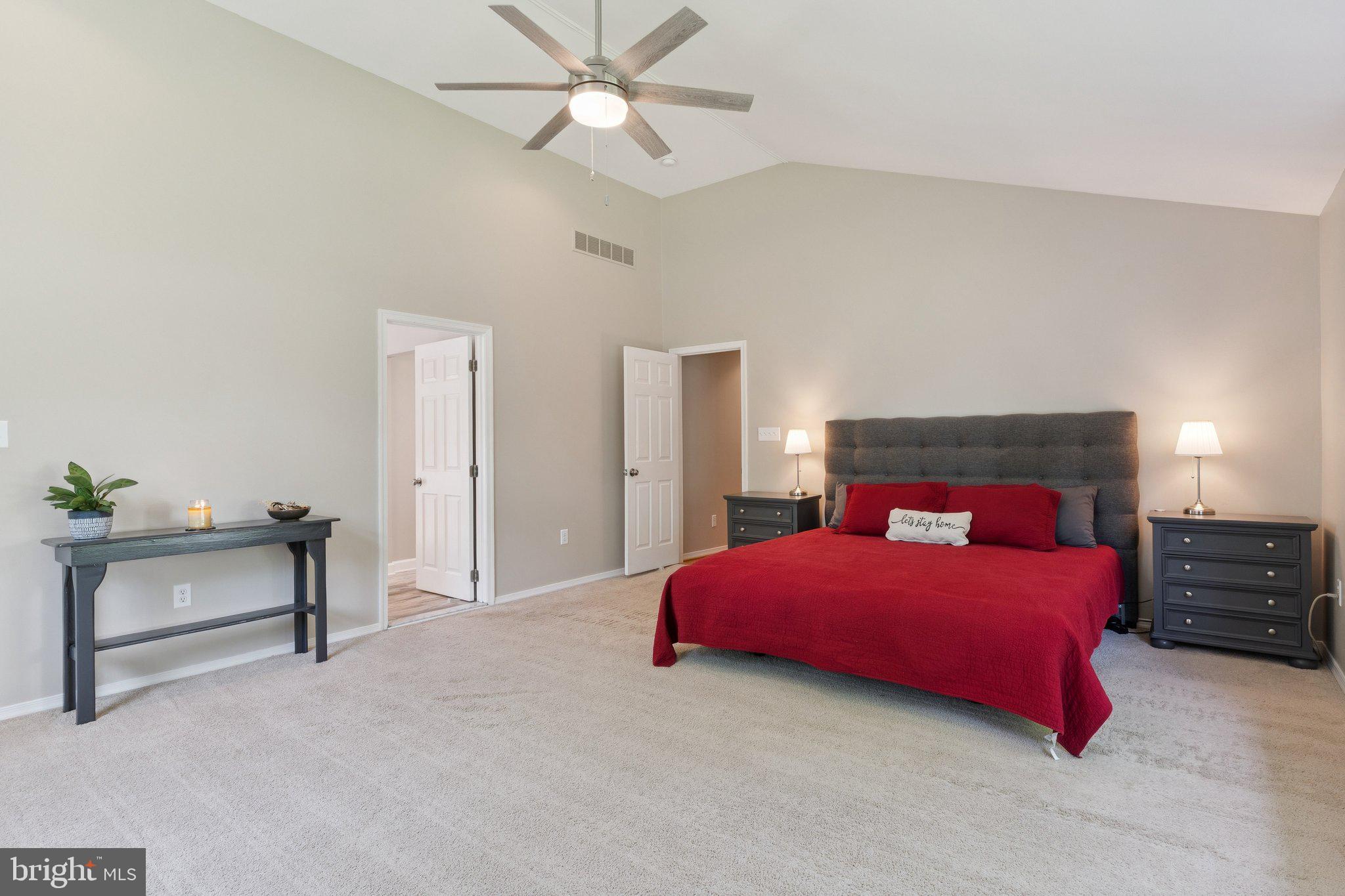 346 Edgewater Road Pasadena, MD 21122 - Photo 24 of 75 a bedroom with a bed and a chandelier