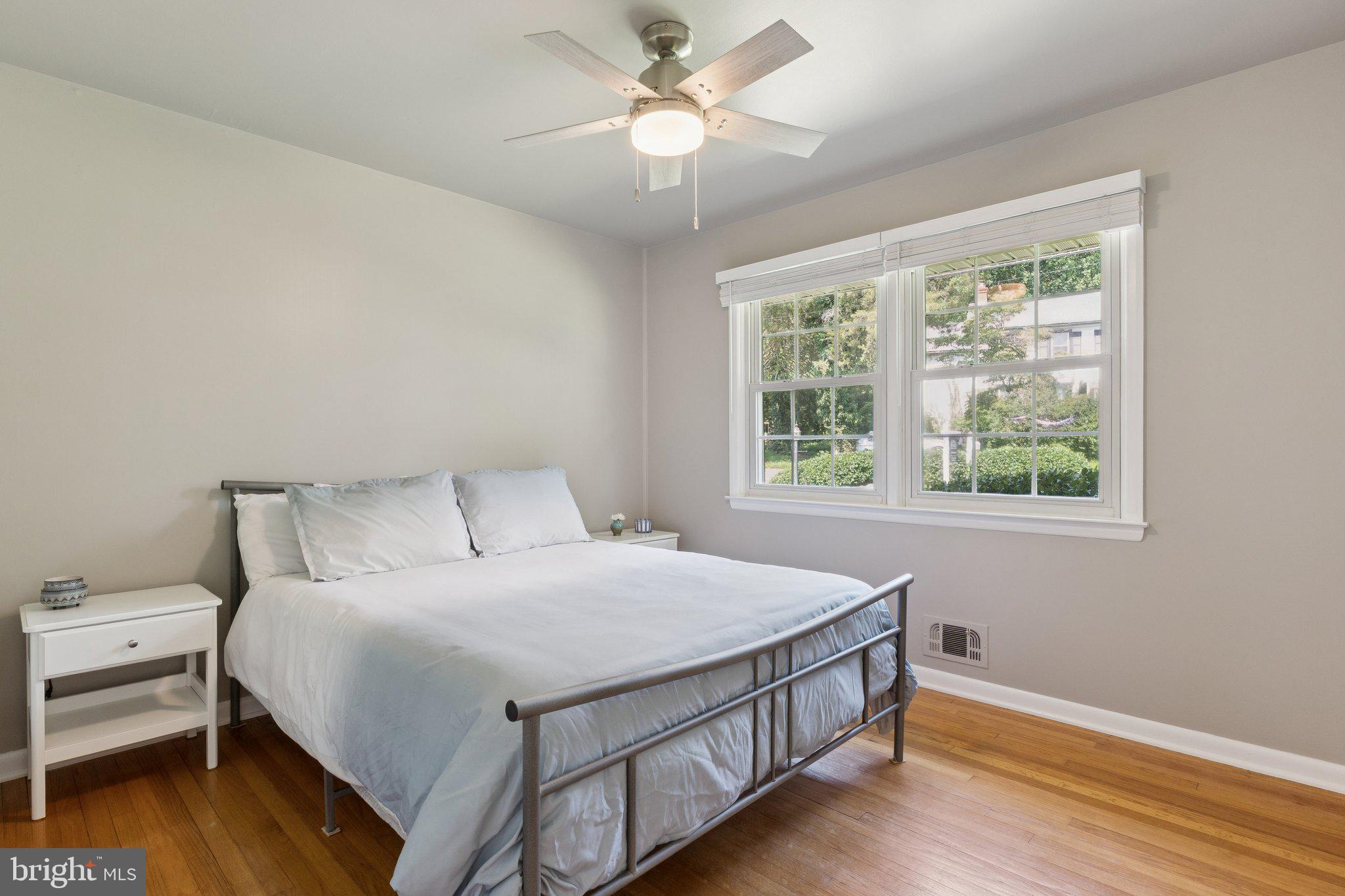 346 Edgewater Road Pasadena, MD 21122 - Photo 32 of 75 a bedroom with a bed and a window