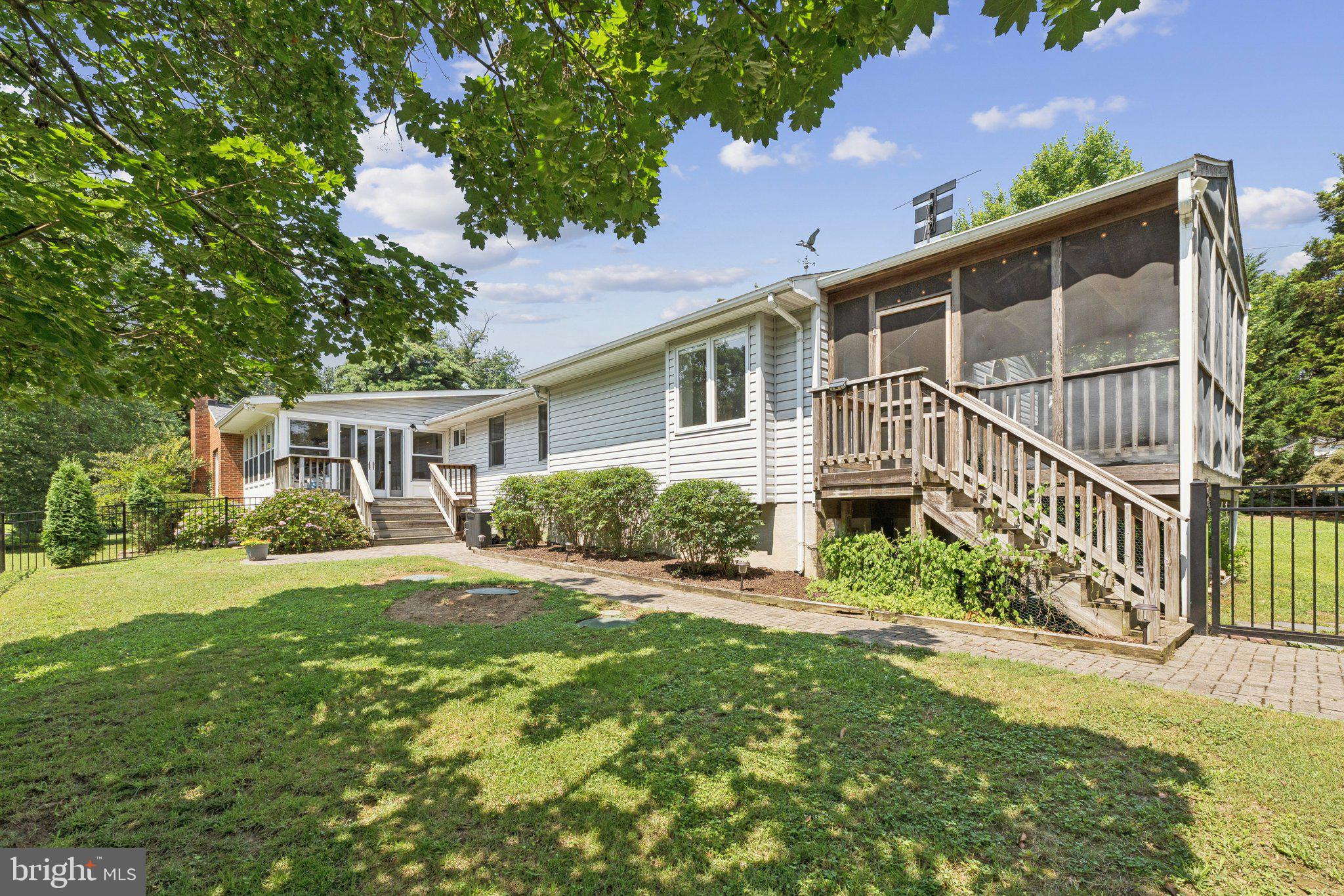 346 Edgewater Road Pasadena, MD 21122 - Photo 45 of 75 a front view of a house with a yard