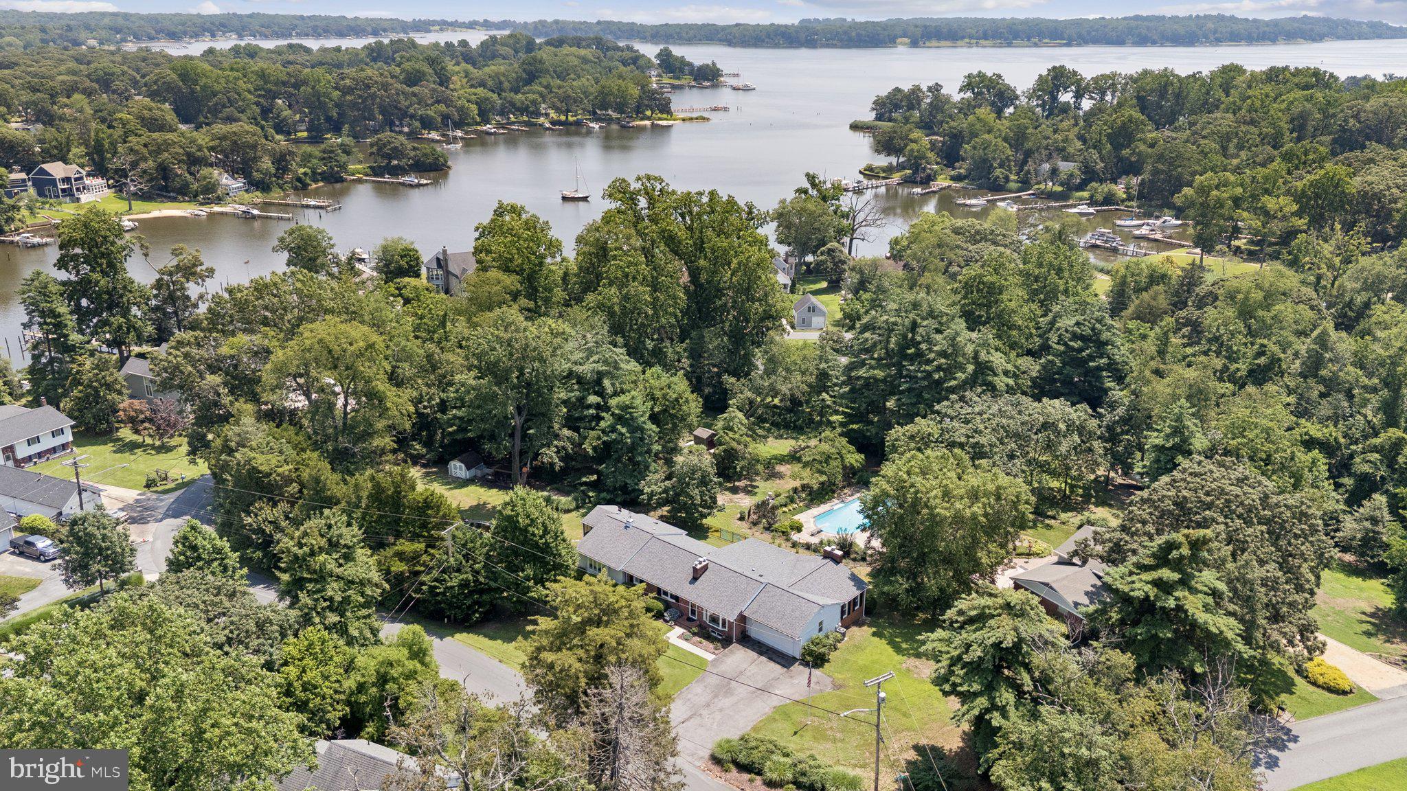 346 Edgewater Road Pasadena, MD 21122 - Photo 55 of 75 an aerial view of residential house with outdoor space and lake view