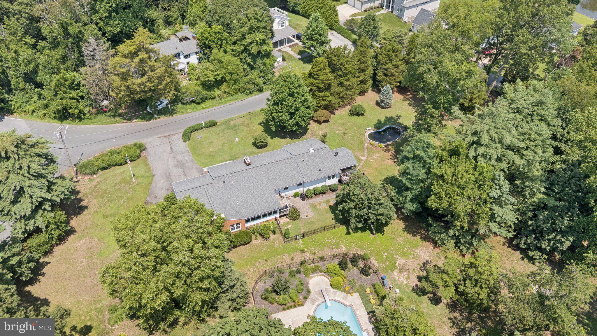 346 Edgewater Road Pasadena, MD 21122 - Photo 60 of 75 an aerial view of a house with a yard