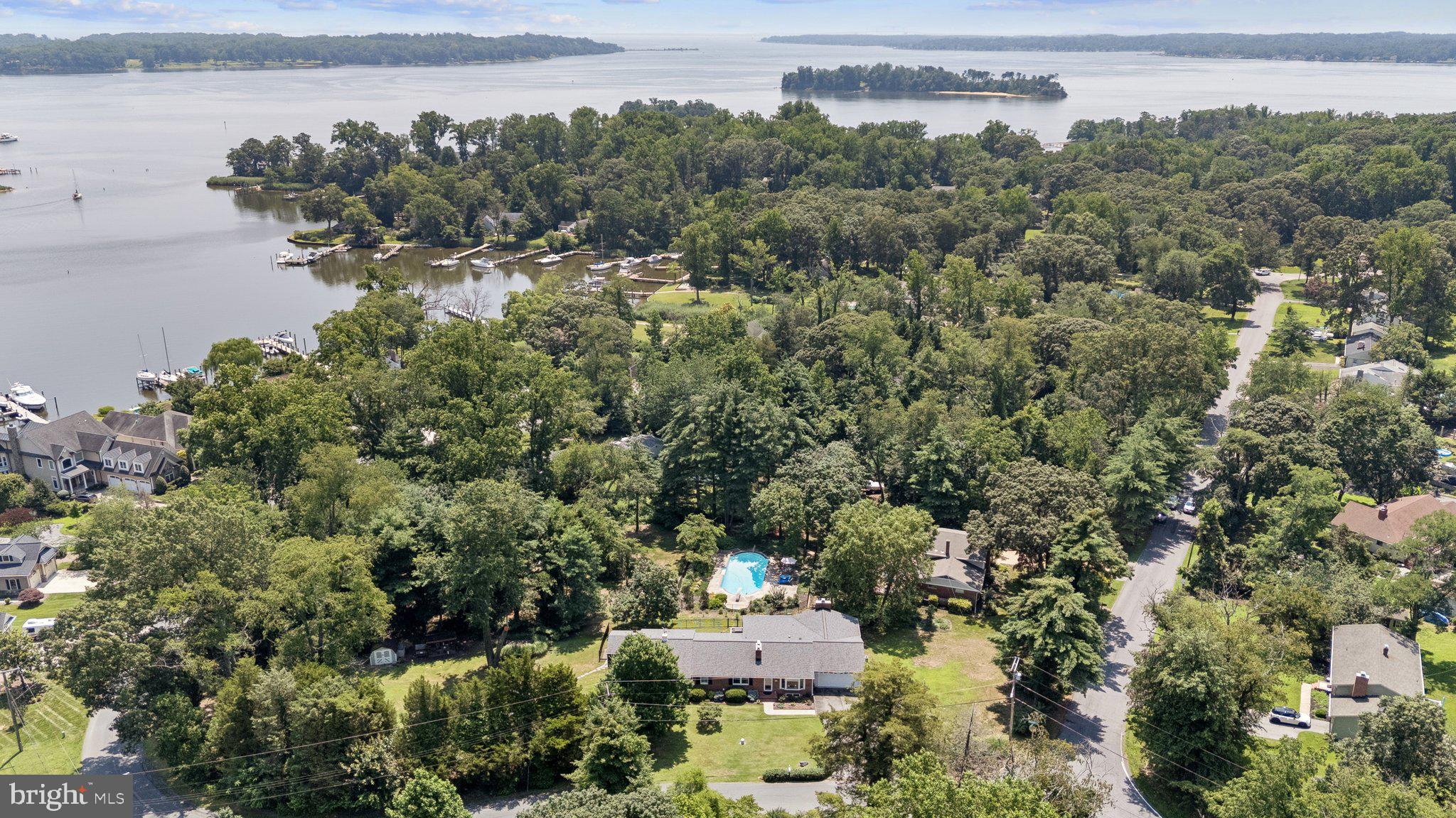 346 Edgewater Road Pasadena, MD 21122 - Photo 64 of 75 an aerial view of a house with a yard and lake view