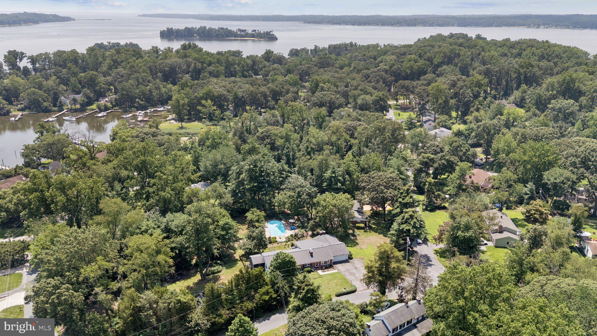 346 Edgewater Road Pasadena, MD 21122 - Photo 65 of 75 an aerial view of a house with a yard