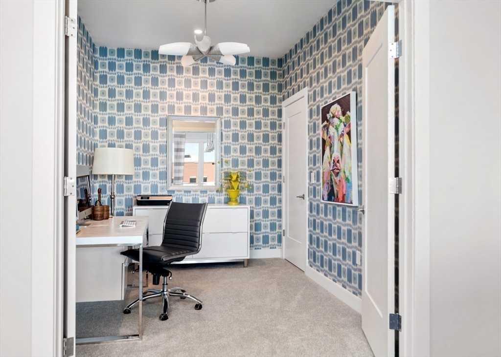 10 Shipyard Drive, Unit 402 Hingham, MA 02043 - Photo 8 of 25 a workspace with furniture and a window